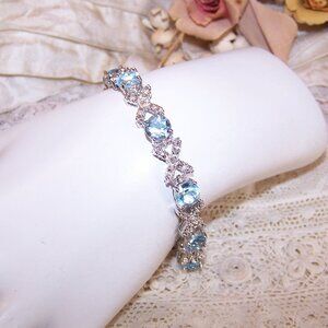 DBJ Dee Berkley Sterling Silver Blue Topaz Diamond "X and O" Link Bracelet